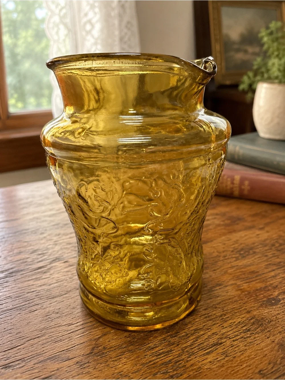 Vintage Amber Pressed Glass Pitcher Ornate Floral Scroll Pattern AS IS Damaged